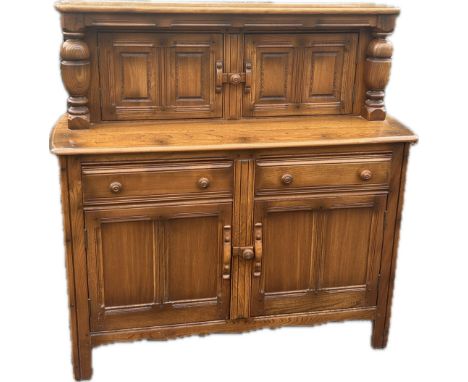 Golden oak buffet Ercol sideboard measures approximately 48 inches long x 48 inches tall and 19 deep 