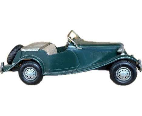MG TF 1:16 scale model car by the C.W. Doepke American Manufacturing Company Inc circa 1950's in racing green with original w