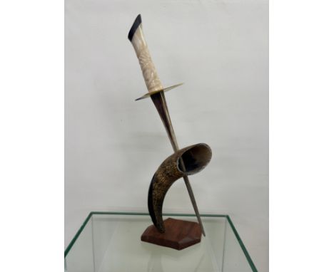 ornamental horn dagger on horn on stand, approximate measurements: Height 20 inches