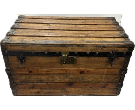 Vintage wood steamer trunk measures approximately 30 inches tall x 17 wide x 17 deep 
