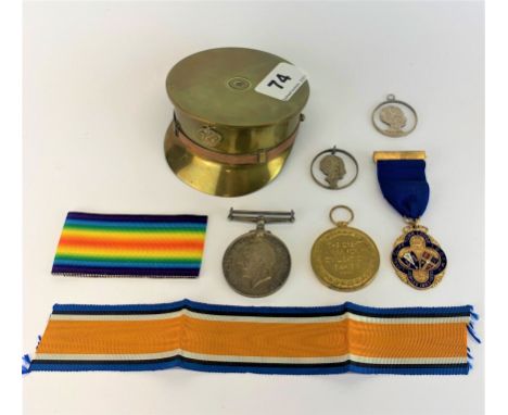 A First World War trench art officers cap, Dia. 8cm. Together with service medals for 290892 SAP. G.A. Croft R.E. and other i