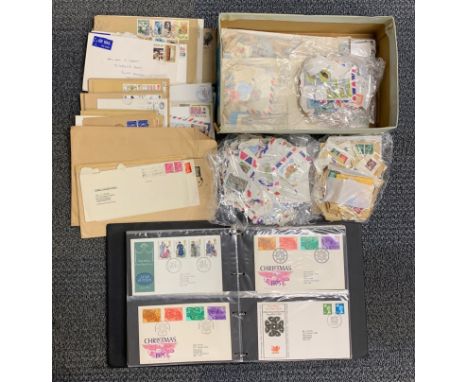 Two albums of first day cover stamps and a quantity of loose stamps.