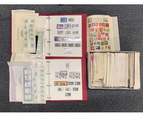 Three albums of British and other stamps and a box of first day covers.