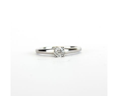 A hallmarked 9ct white gold solitaire ring set with a brilliant cut diamond, approx. 0.30ct, with diamond report I-1 clarity,