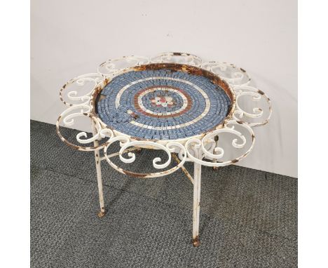 A vintage wrought iron and tile topped garden table, 42 x 61cm. Some tile pieces loose.