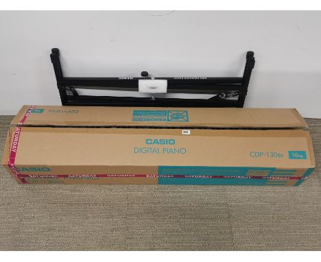 A boxed Casio CDP-130BK digital piano, piano L. 135cm, opened but contents untouched, together with a Duronic piano stand.