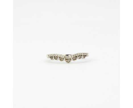 A hallmarked 9ct white gold diamond set wishbone ring, (M.5).