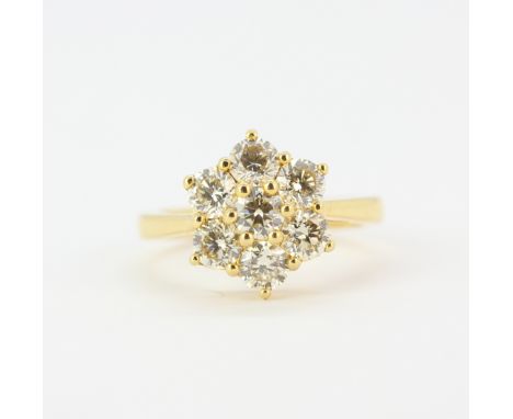 An 18ct yellow gold daisy cluster ring set with large brilliant cut diamonds, approx. 2.30ct total, (O).