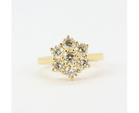 An 18ct yellow gold daisy cluster ring set with large brilliant cut diamonds, approx. 2.30ct total, (O).