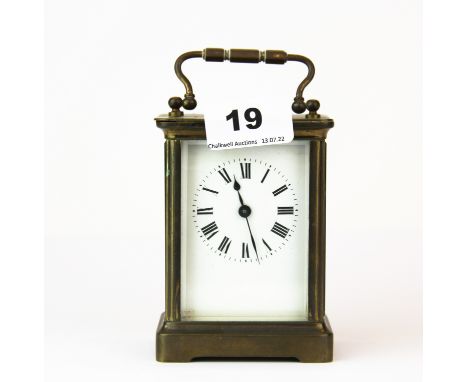 A brass carriage clock, H. 14cm.