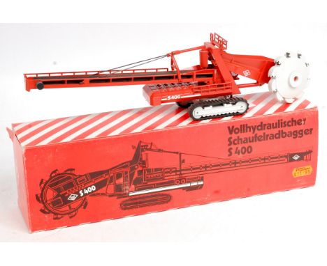 NZG No.194 "O&K" Schaufelradbagger S400 Excavator, finished in red, grey and black, in the original all card box with packagi