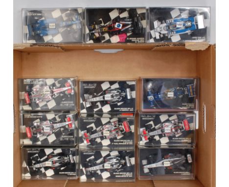 Minichamps 1/43rd scale Formula 1 Group, 12 plastic cased examples, to include Mclaren Mercedes, Prost and Ligier Ford, speci