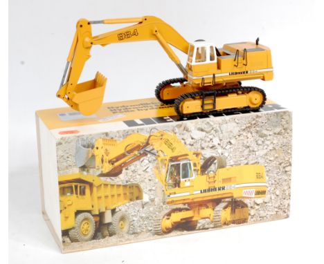 Conrad No.2828 1/50th scale model of a Liebherr Hydraulic Excavator, finished in mustard yellow and white, in the original po