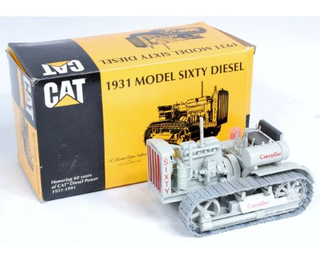 Conrad No.2873 1/25th scale model of a Caterpillar 1931 Model Sixty Diesel Crawler Tractor finished in Grey with metal tracks