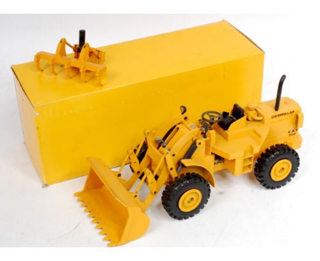 Strenco (Germany) 1/50th scale diecast model of a CAT 950 Front Loader, with rear attachment, finished in mustard yellow with