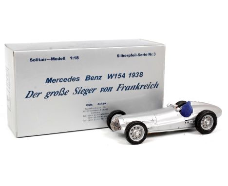 CMC of Germany, 1/18th scale Mercedes W154 "1938", silver body with blue seats, wire wheels, in the original polystyrene pack