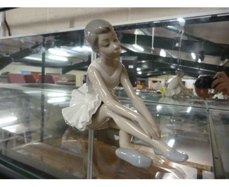 Seated Nao figure of a ballerina