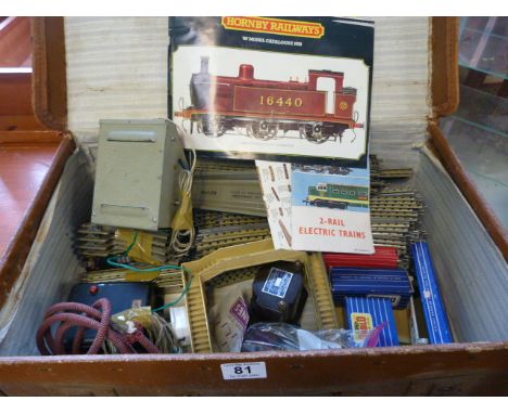 Vintage suitcase containing various Hornby Dublo track, signals, transformers etc