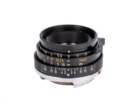 A Leitz Summicron f/2 35mm Lens, 2nd version, black, serial no. 2307652, body, G-VG, elements, G, some internal marks, comple