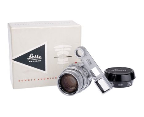 A Leitz Summicron Dual-Range f/2 50mm Lens, chrome, serial no. 1764201, body, G-VG, elements, VG, haze to middle group, compl