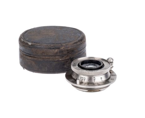 A Leitz Elmar f/3.5 35mm Lens, nickel, serial no. 215919, body, VG, elements, VG, some light internal haze, compete with smal