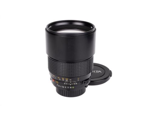 A Minolta MD f/2 135mm Lens, black, serial no. 1001462, body, VG-E, elements, VG-E, some very light internal haze, complete w