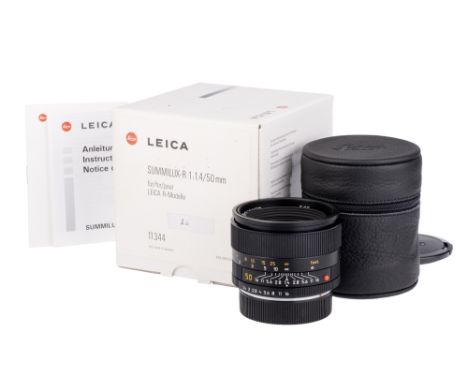 A Leitz Summilux-R f/1.4 50mm Lens, ROM, black, serial no. 3821499, body, E, elements, E, complete with warranty card, instru