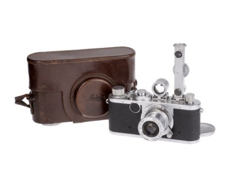 A Leica Ic Camera, 1951, chrome, serial no. 561095, with Leitz Elmar f/3.5 50mm lens, chrome, serial no. 805818, body, VG-E, 