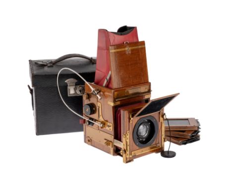 A Soho Tropical Quarter Plate Reflex Camera, English, c.1920, teak, serial number M3816, withROSS, London Xpres 5 1/2In 1:4.5
