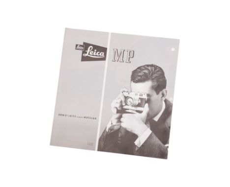 A Leica MP Brochure, Germany, black and white printed, holes punched to one edge