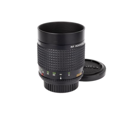 A Minolta RF Rokkor f/5.6 250mm Lens, black, serial no. 1008093, body, G-VG, elements, VG, some light internal haze, complete