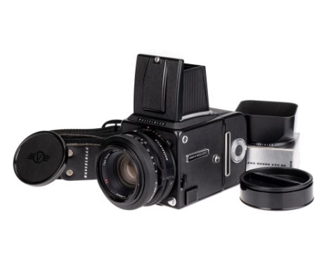 A Hasselblad 2000FC/M Medium Format Camera, 1983, black, serial no. RP1517828, with Carl Zeiss Planar T* f/2.8 80mm lens, bla