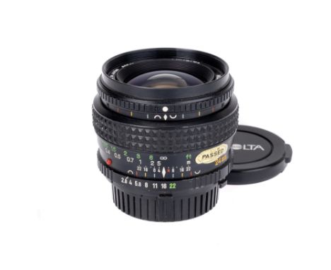 A Minolta MD VFC Rokkor f/2.8 24mm Lens, black, serial no. 2202266, body, G-VG, elements, VG, some light internal haze, compl