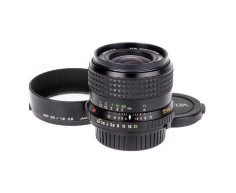 A Minolta MD W.Rokkor f/1.8 35mm Lens, black, serial no. 2007347, body, VG, elements, G-VG, some light internal haze