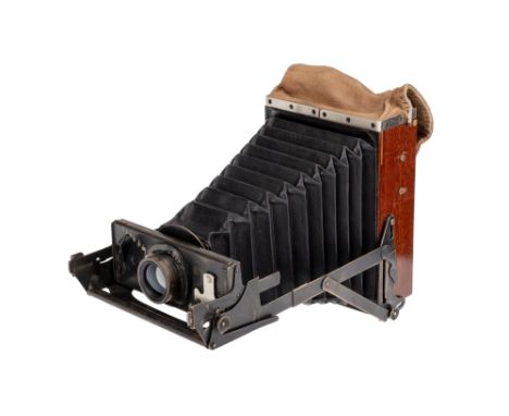 A Newman &amp; Guardia Nydia 9x12cm Camera, body VG, possible early serial no: stamped "15" to inside of rear cover, stamped 