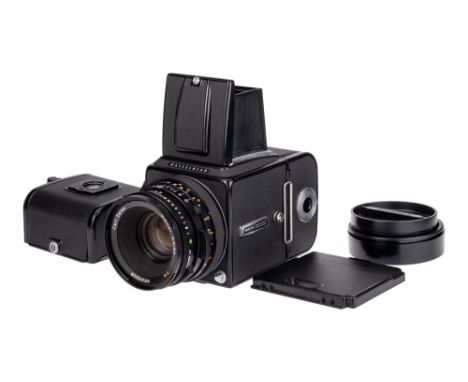 A Hasselblad 500CM Medium Format Camera, 1981, black, serial no. RI1286346, with Carl Zeiss Planar T* CF f/2.8 80mm lens, bla