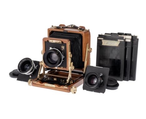 A Wista 4x5" Large Format Field Camera, serial no. 55283, with Rodenstock Sironar f/5.6 180mm lens, black, serial no. 9225658
