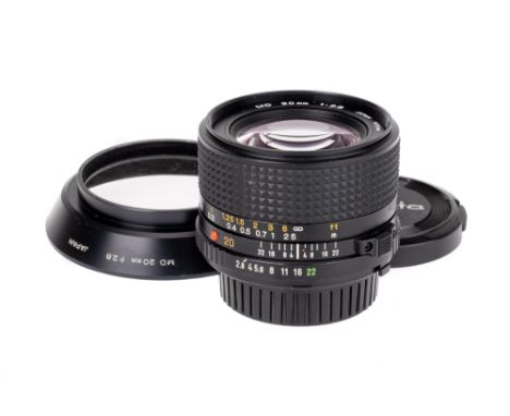 A Minolta MD f/2.8 20mm Lens, black, serial no. 8002998, body, VG-E, elements, VG-E, complete with maker's caps