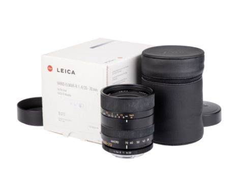 A Leitz Vario-Elmar-R f/4 35-70mm Lens, black, serial no. 3776050, body, E, elements, VG-E, complete with lens hood, warranty