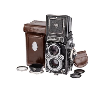 A Rollei Rolleiflex 3.5F Medium Format TLR Camera, 1958-60, black, serial no. 2218613, with Schneider Xenotar f/3.5 75mm lens