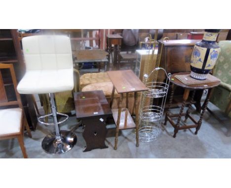 Furniture including chair, tables, lamp standard, wire racks and a large vase