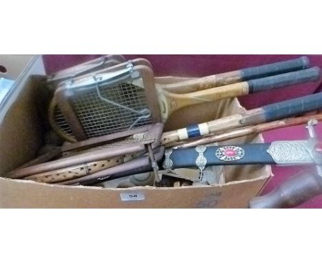 Three vintage tennis rackets, balls, tribal spear etc