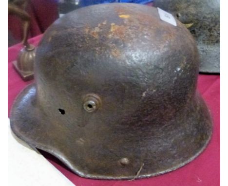 A WW1 1917 pattern German army helmet shell with wide assault peak