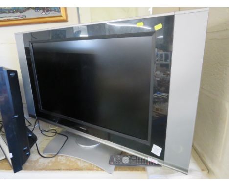 HITACHI 32 INCH LCD TELEVISION WITH REMOTE AND MANUAL