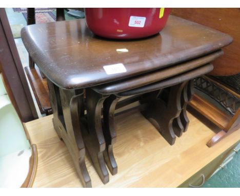 ERCOL DARK ELM NEST OF THREE OCCASIONAL TABLES