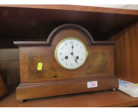 STRIKING PENDULUM MANTLE CLOCK IN AN INLAID MAHOGANY CASE