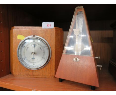 OAK CASED ANEROID BAROMETER AND A METRONOME