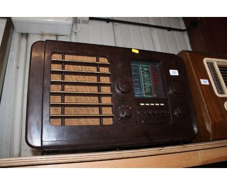 An Ekco Bakerlite cased vintage radio