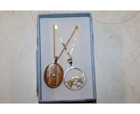 A Sterling silver gilt and tigers eye pendant necklace; and a Sterling silver and silver gilt necklace 