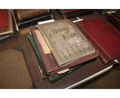 A Victorian scrap album, contents of miscellaneous prints, cuttings etc.  Another similar, and three albums of newspaper cutt